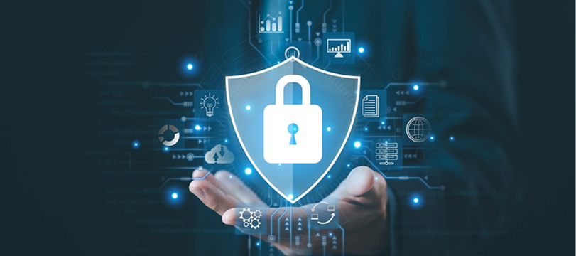 Digital shield with padlock hovering above a hand, symbolizing cybersecurity and data protection.