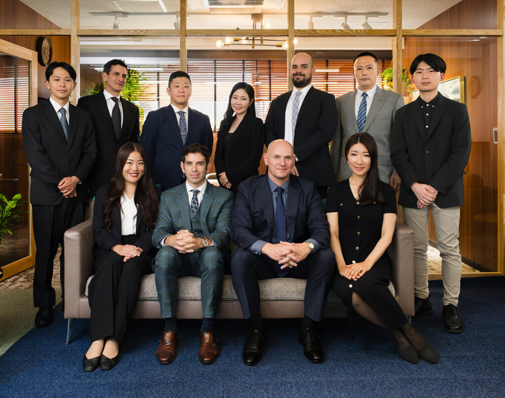 Group photo of Ryze professionals gathered in an office setting.
